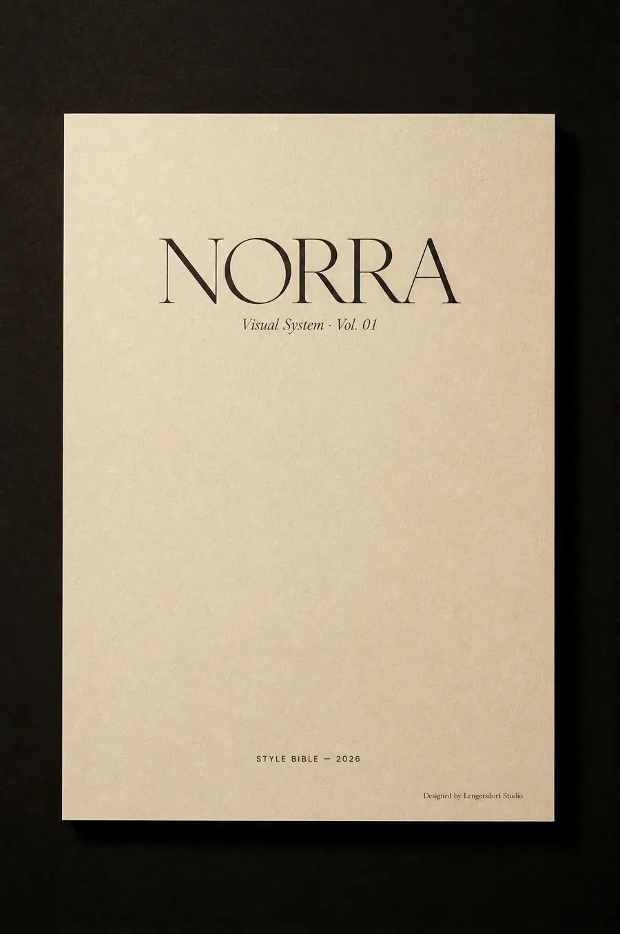 Cover mit dem Schriftzug NORRA auf dunklem Grund